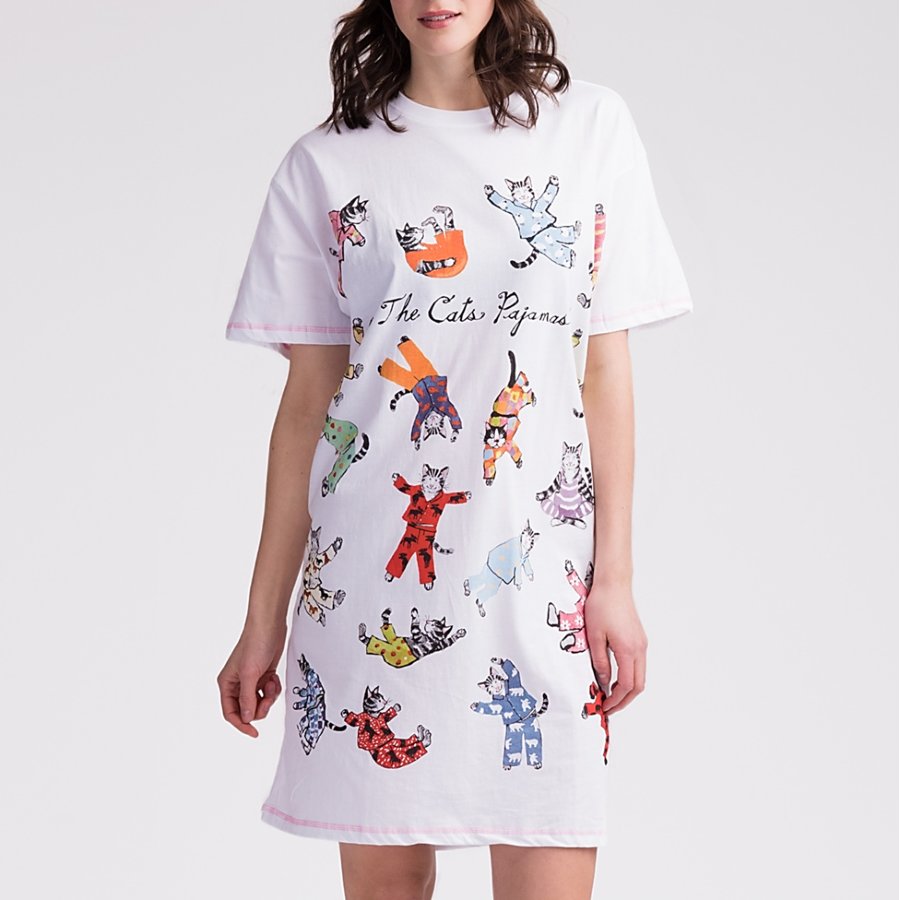White pajama dress with colorful cat illustrations on a white background