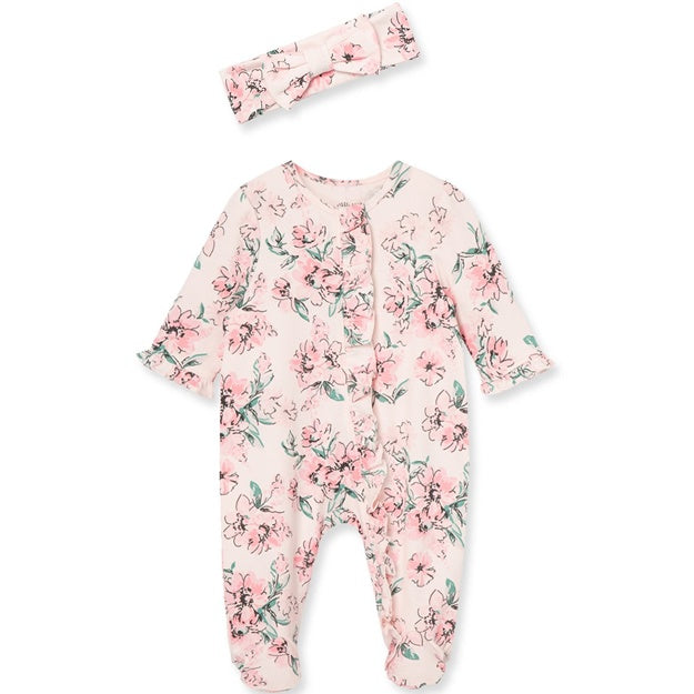 Floral baby onesie with matching headband on a white background