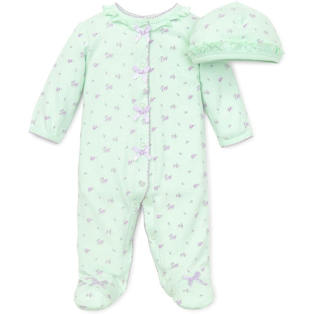 Green baby onesie with Floral designs on a white background