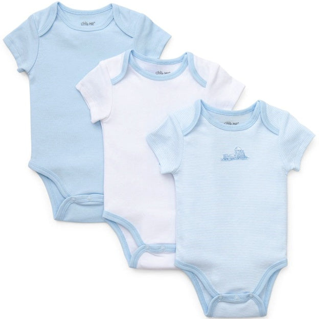 Three baby bodysuits with different patterns on a white background