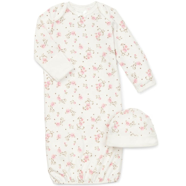 Pink baby gown with matching hat on a white background