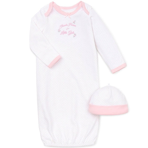 Pink baby gown with matching hat on a white background