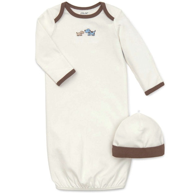 Baby gown and hat set with dogs on a white background
