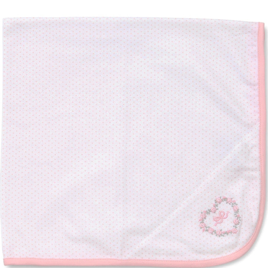 White towel with pink border and embroidered design on a white background