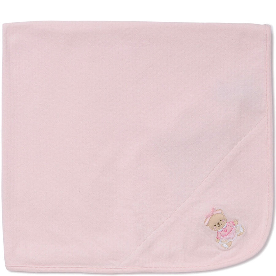 Pink baby blanket with a teddy bear design on a white background