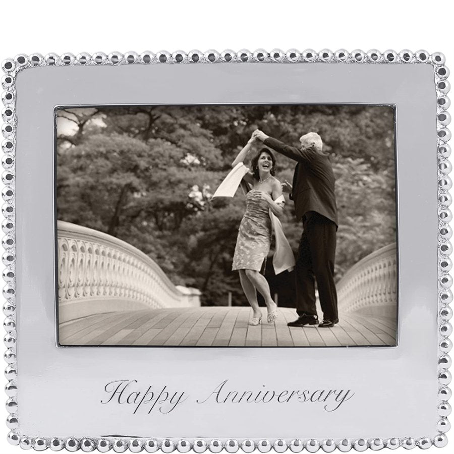 Silver frame with 'Happy Anniversary' text containing a black and white photo of a couple dancing.