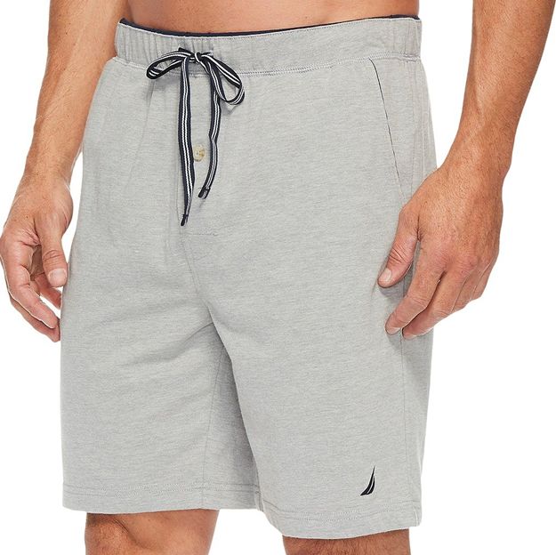 Gray shorts with a drawstring and brand logo on a white background