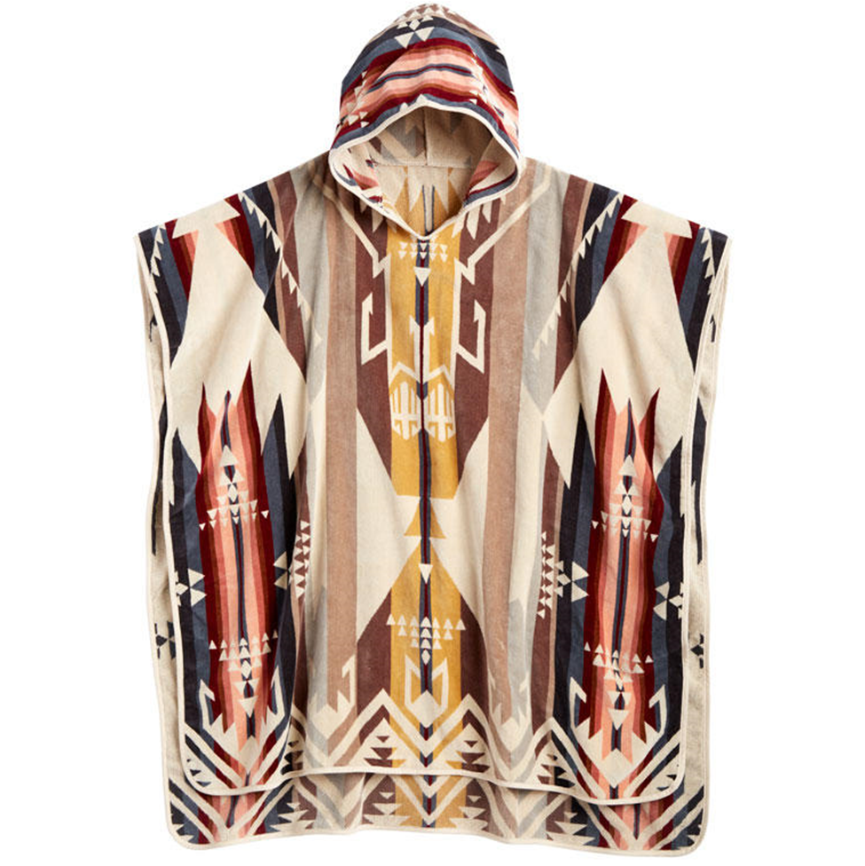 Hooded poncho with geometric pattern on a white background