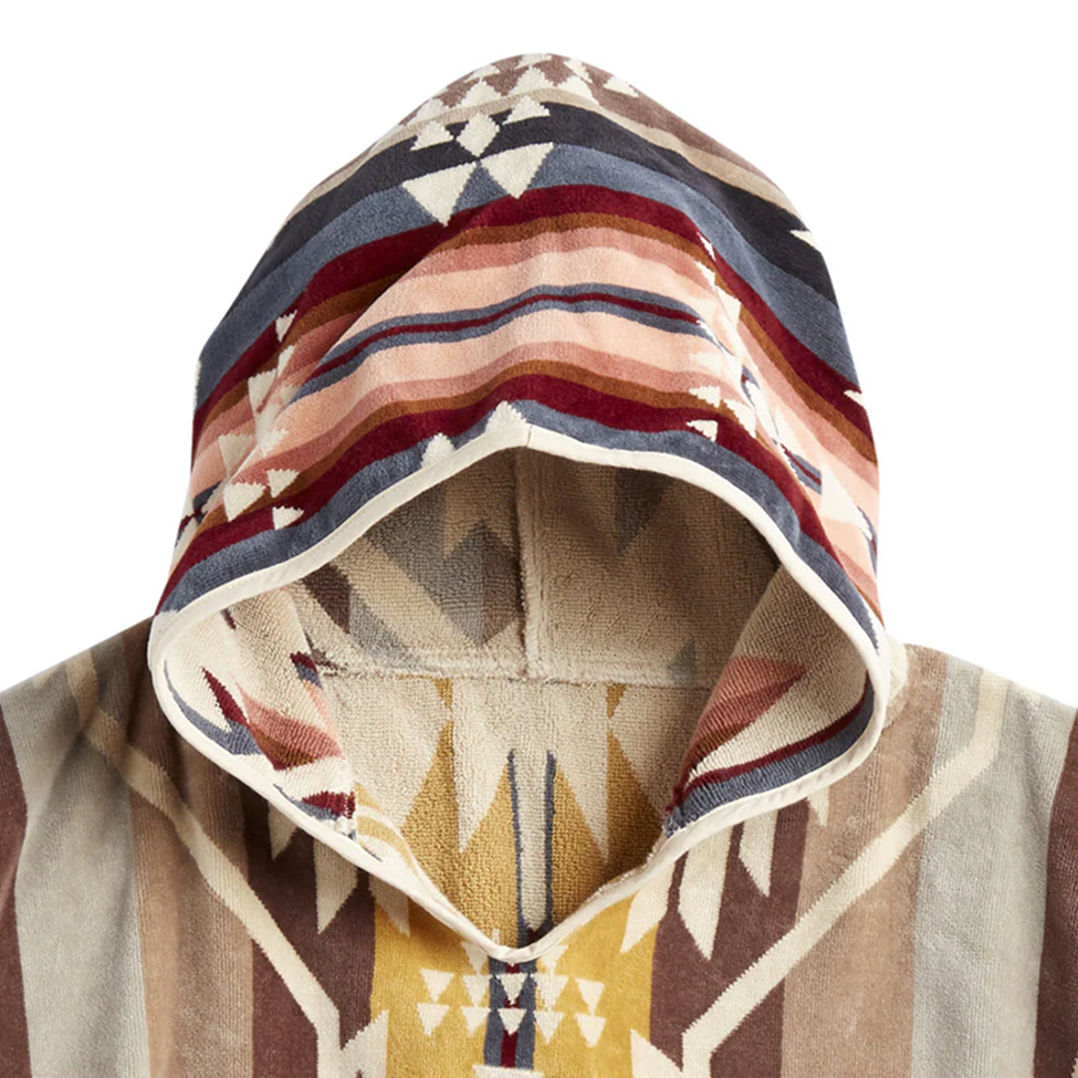Hooded garment with geometric pattern on a white background