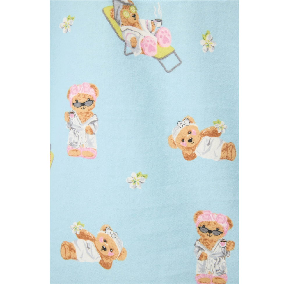 Pattern of teddy bears on a light blue background