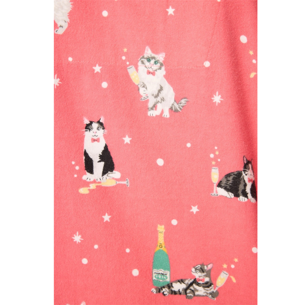 Fabric with cat illustrations on a pink background