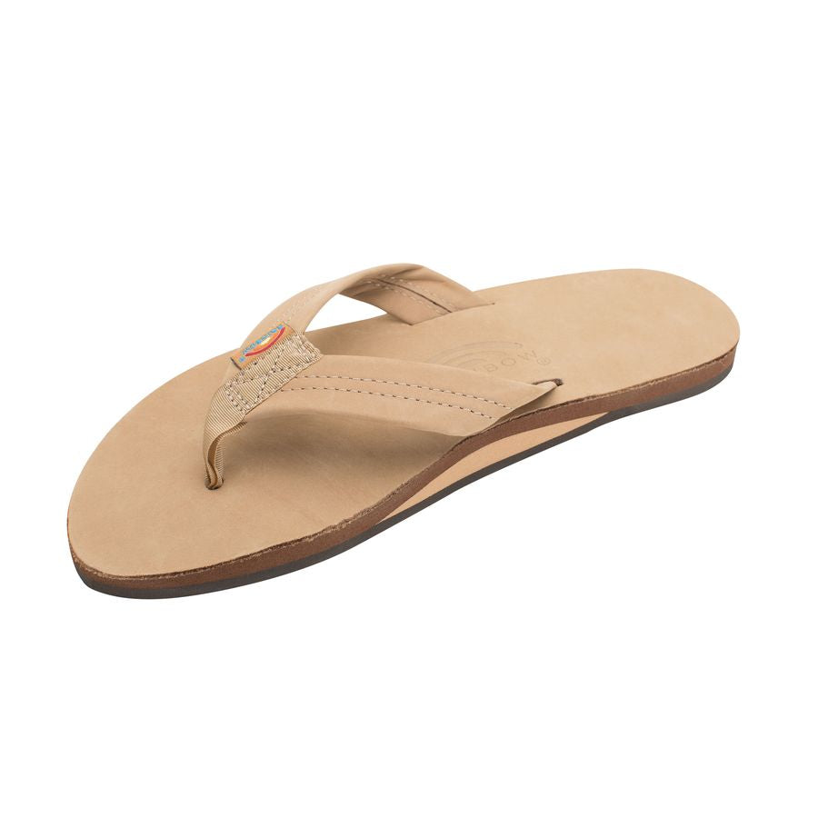 Beige sandal on a white background