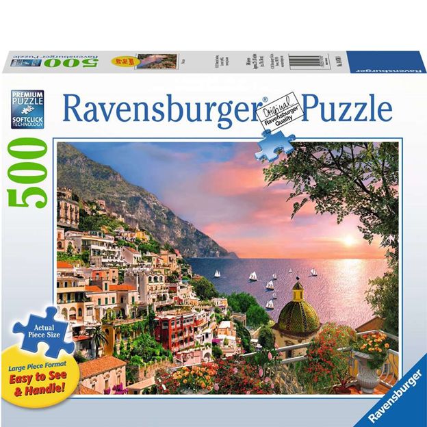 Ravensburger puzzle box with a scenic view of a coastal town at sunset.