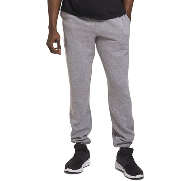 Person wearing gray sweatpants on a white background