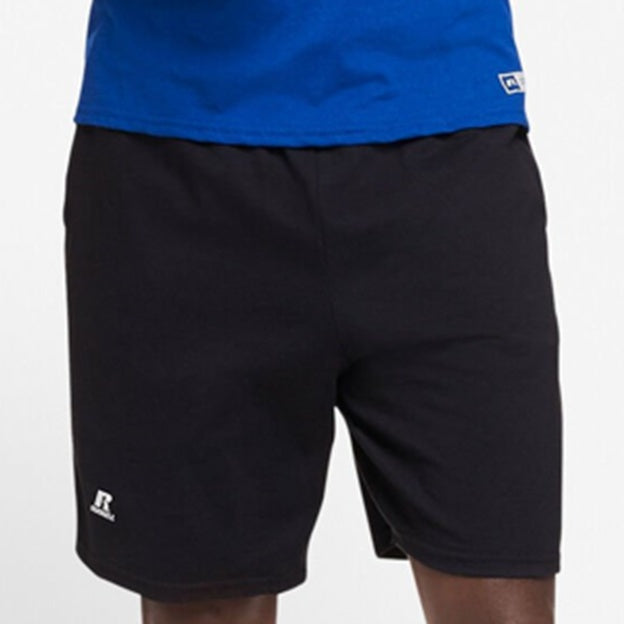 Black shorts with a blue top on a white background