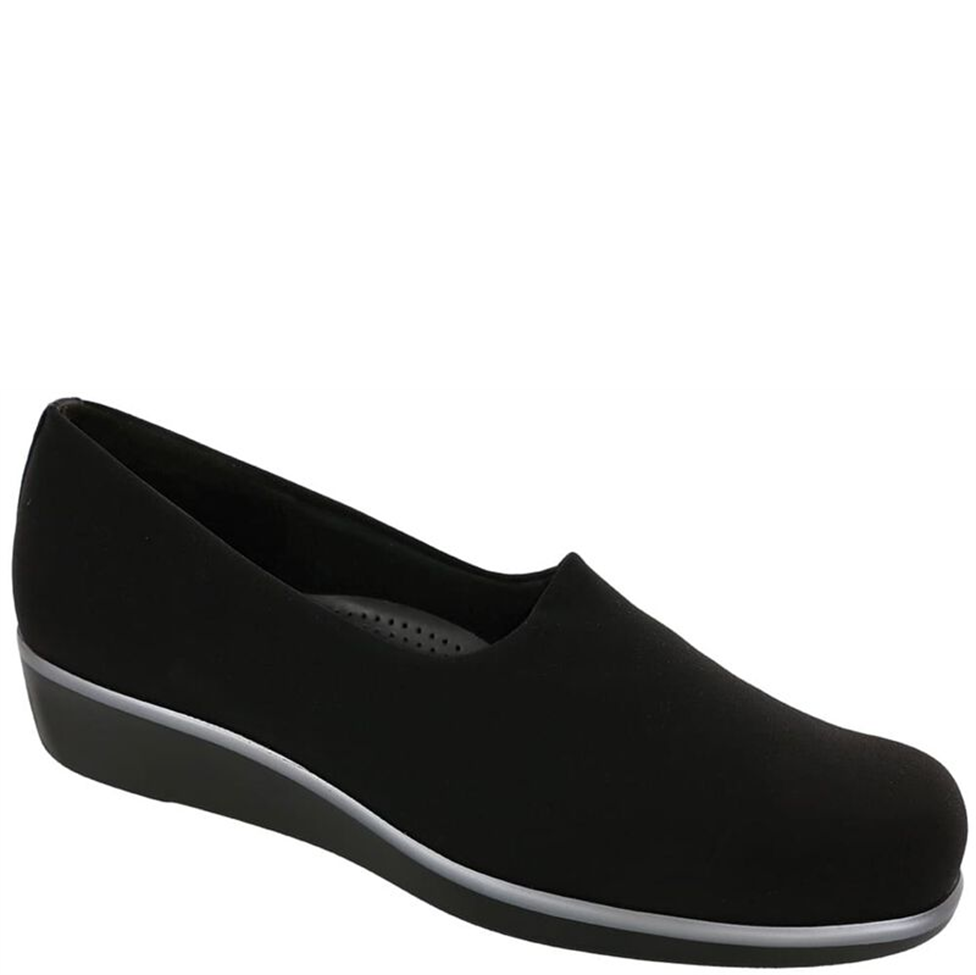 Black slip-on shoe on a white background