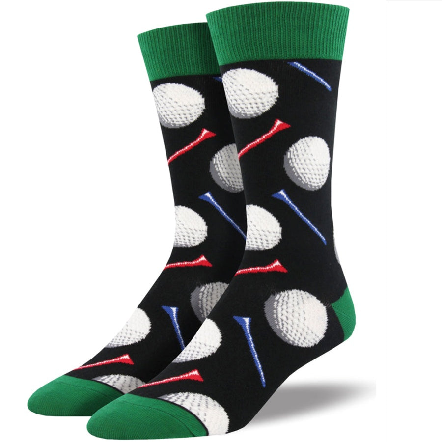 Golf-themed socks with golf balls and tees on a black background