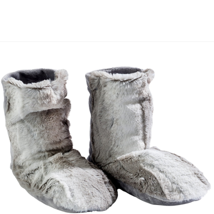 Pair of gray fuzzy slippers on a white background
