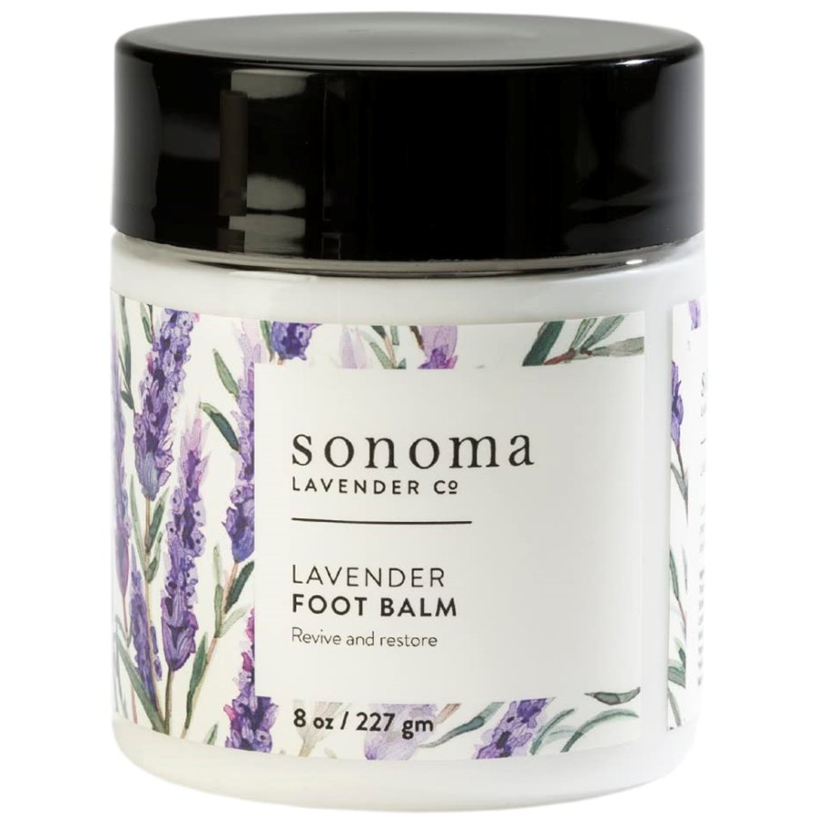 Jar of Sonoma Lavender Co. lavender foot balm with black lid on a white background