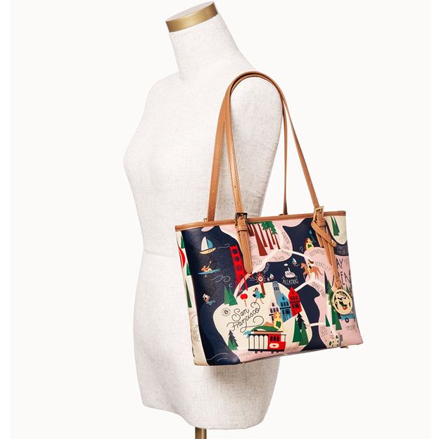 Tote bag with artistic design on a mannequin against a white background