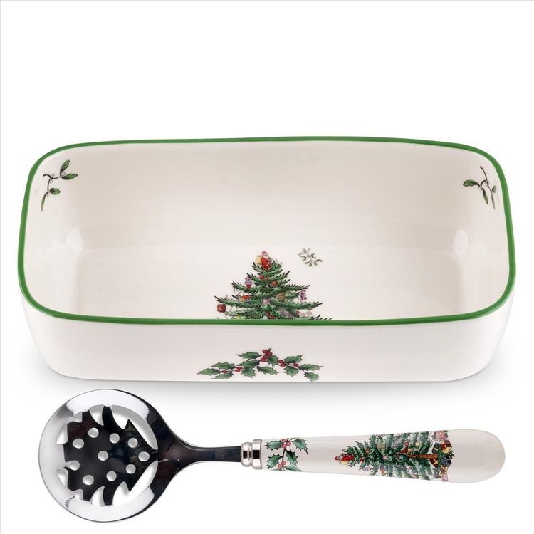 Rectangular ceramic dish with Christmas tree design and matching ladle on a white background