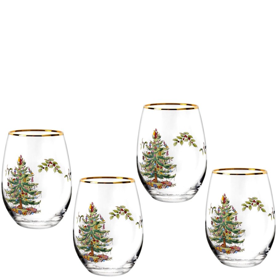 Set of four stemless wine glasses with Christmas tree design on a white background