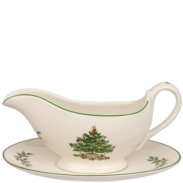 Spode Christmas Tree gravy boat and saucer set on a white background