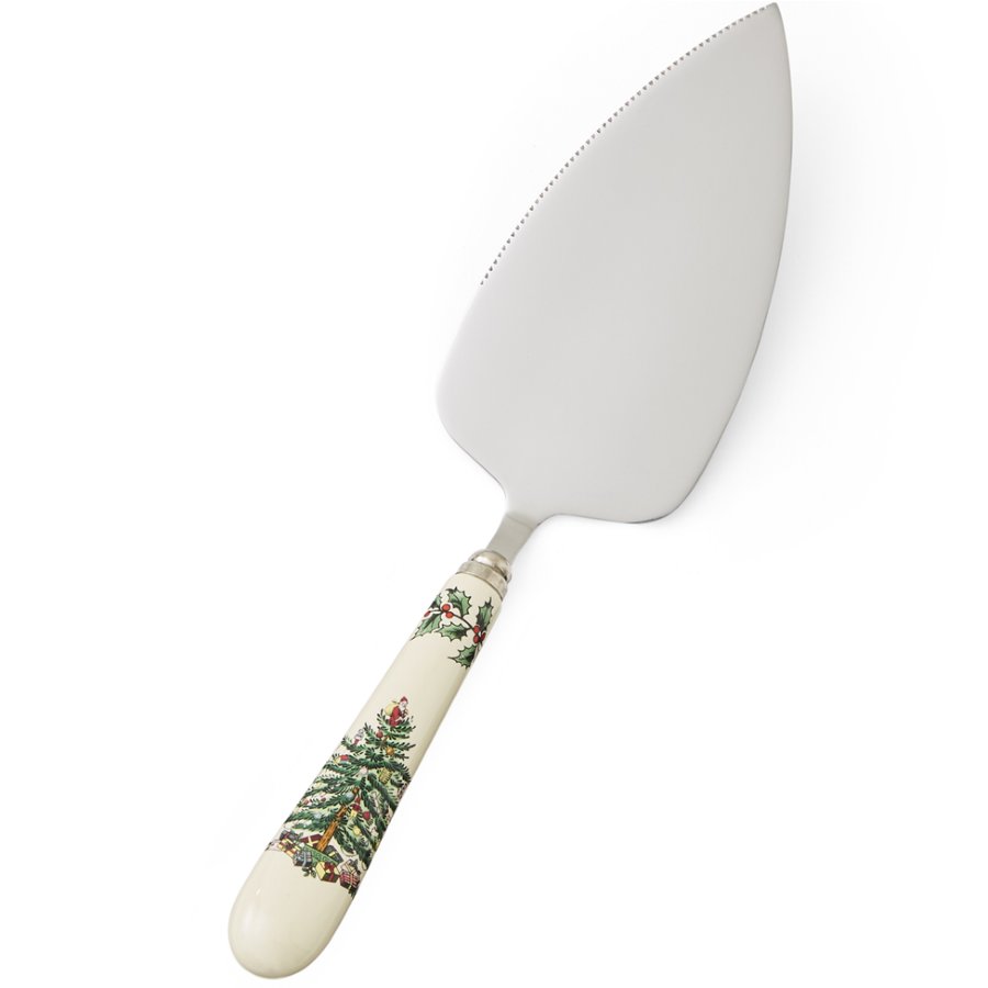 Pie server with Christmas tree design on handle against a white background