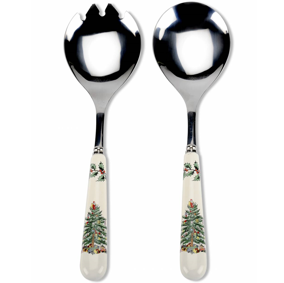 Set of two silver spoons with Christmas tree design handles on a white background