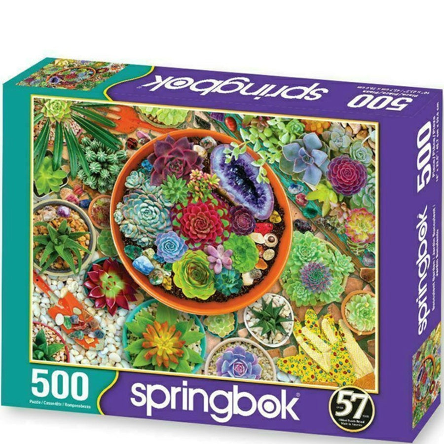 Springbok 500-piece puzzle box with a colorful design of plants and geodes.