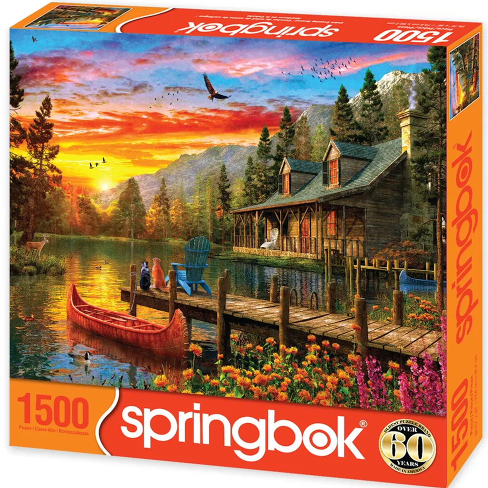 Springbok puzzle box with a scenic lake and cabin design