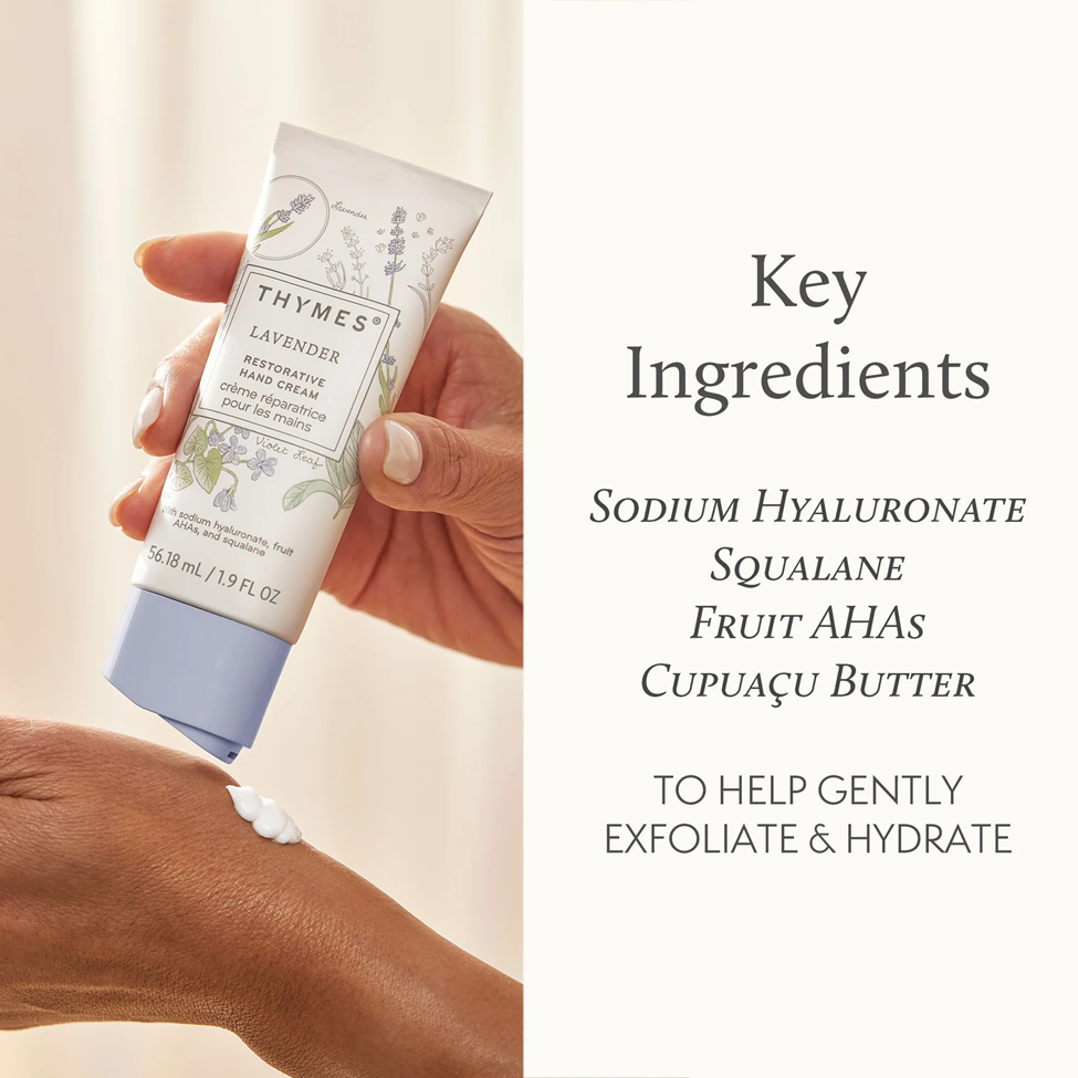 Thymes lavender restorative hand cream being applied to a hand with key ingredients listed on the side.