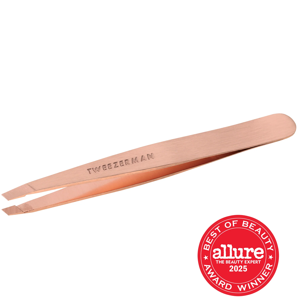 Rose gold tweezers with 'Tweezer Man' branding on a white background, featuring the Allure Best of Beauty Award 2025 badge.