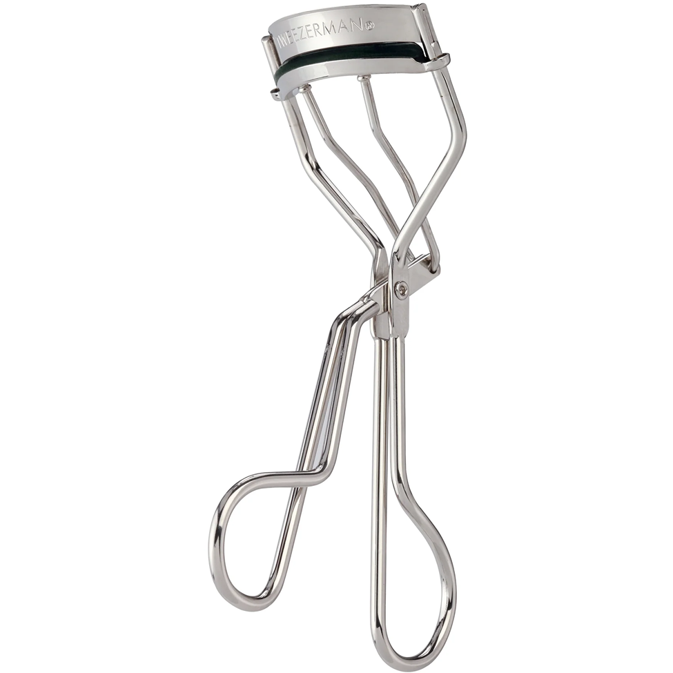 Eyelash curler with Thermacare branding on a white background