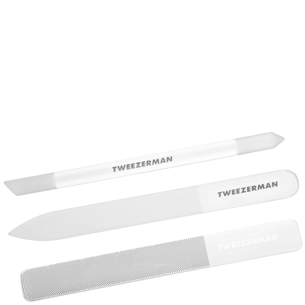Three white nail files with 'Tweezerman' branding on a white background