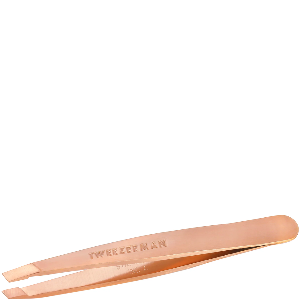 Rose gold tweezers with 'TweezerMan' branding on a white background
