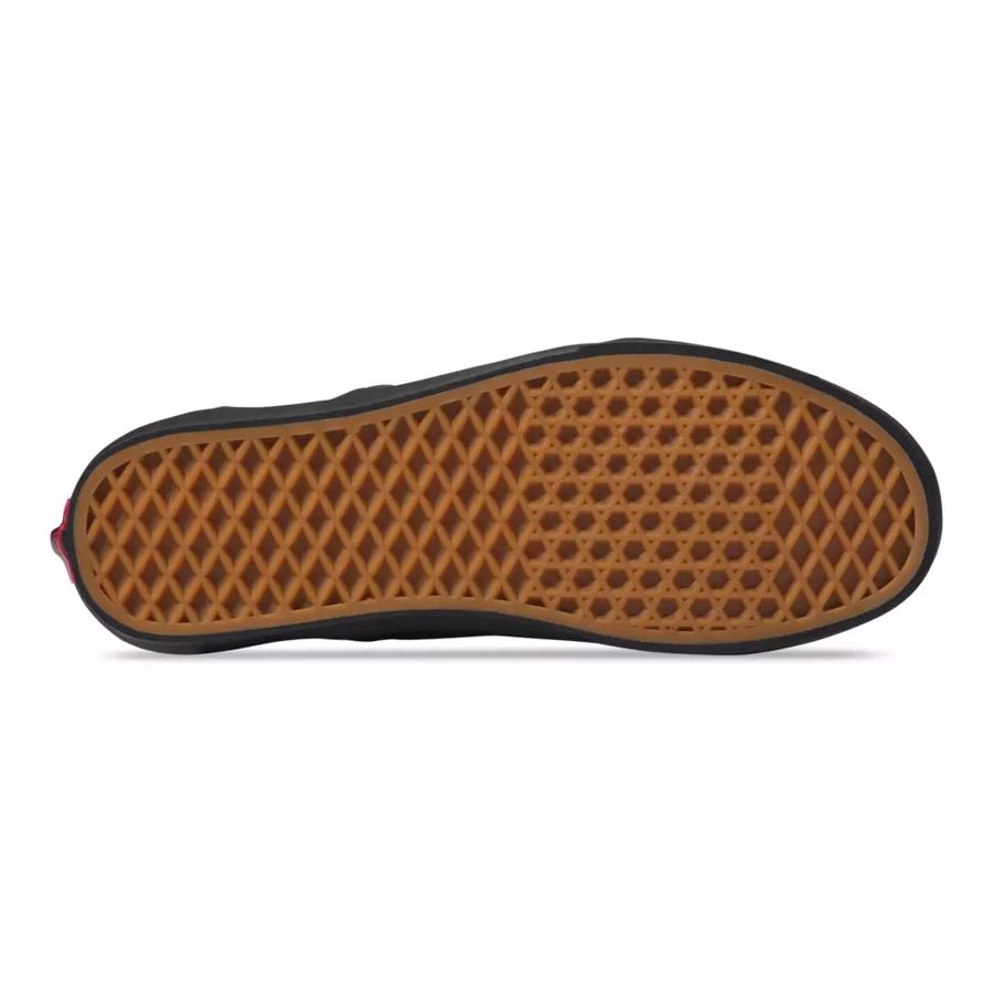 Brown shoe sole with diamond pattern on a white background