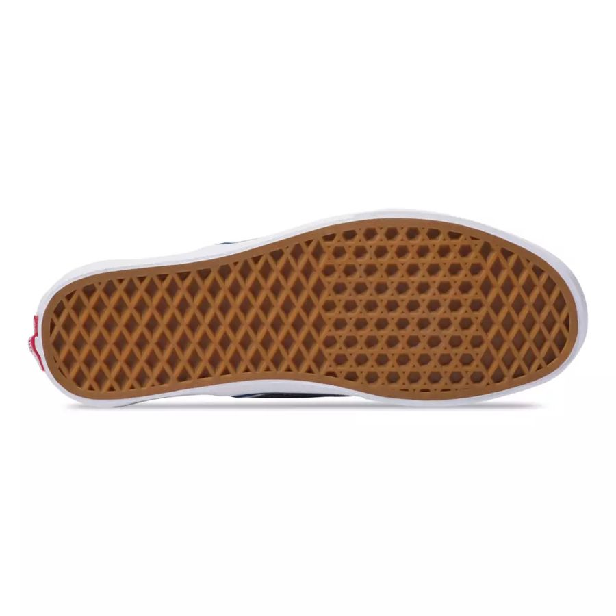 Close-up of a brown textured shoe sole on a white background
