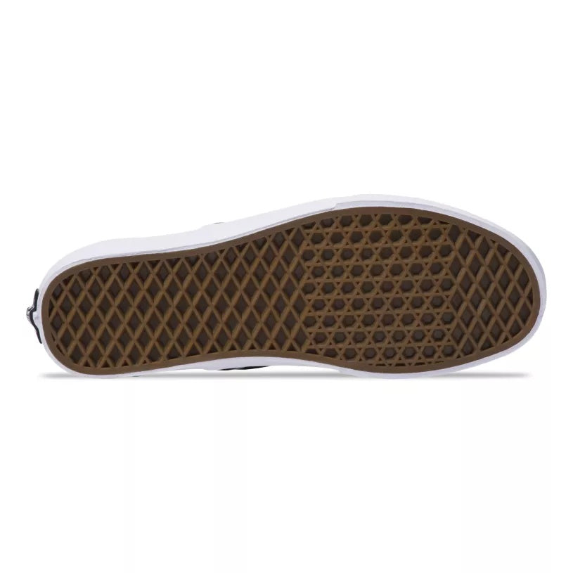 Close-up of a shoe sole with brown and white pattern on a white background