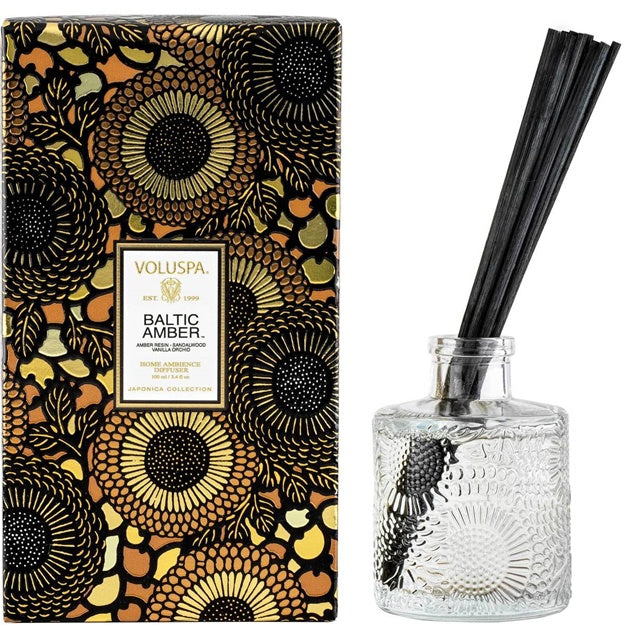 Voluspa Baltic Amber diffuser set with decorative box on a white background