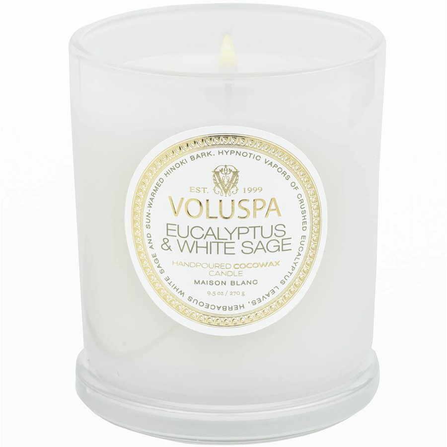 Voluspa candle with eucalyptus and white sage scent on a white background