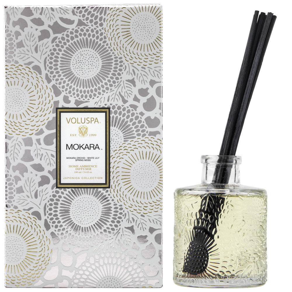 Voluspa Mokara diffuser with packaging featuring floral patterns