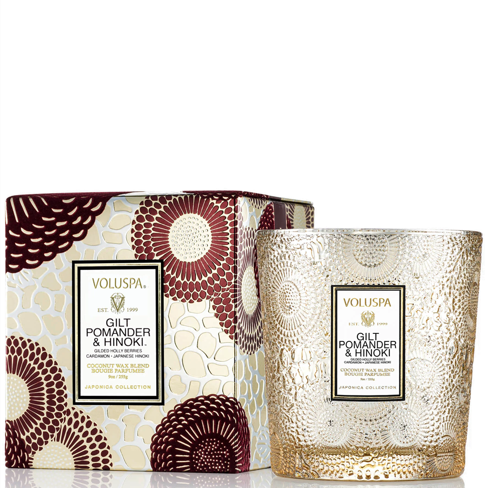 Voluspa candle with decorative packaging on a white background