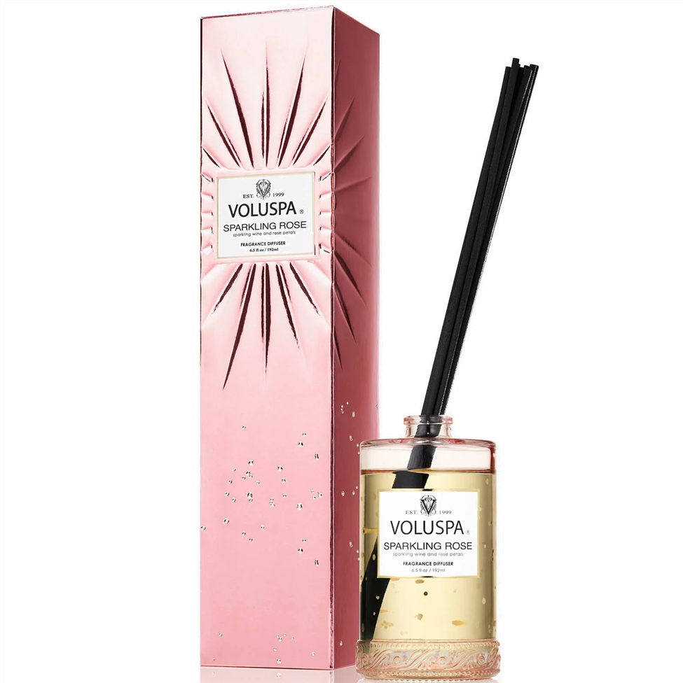Voluspa Sparkling Rose diffuser with pink packaging on a white background