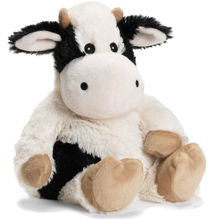 Plush cow toy with black and white pattern on a white background