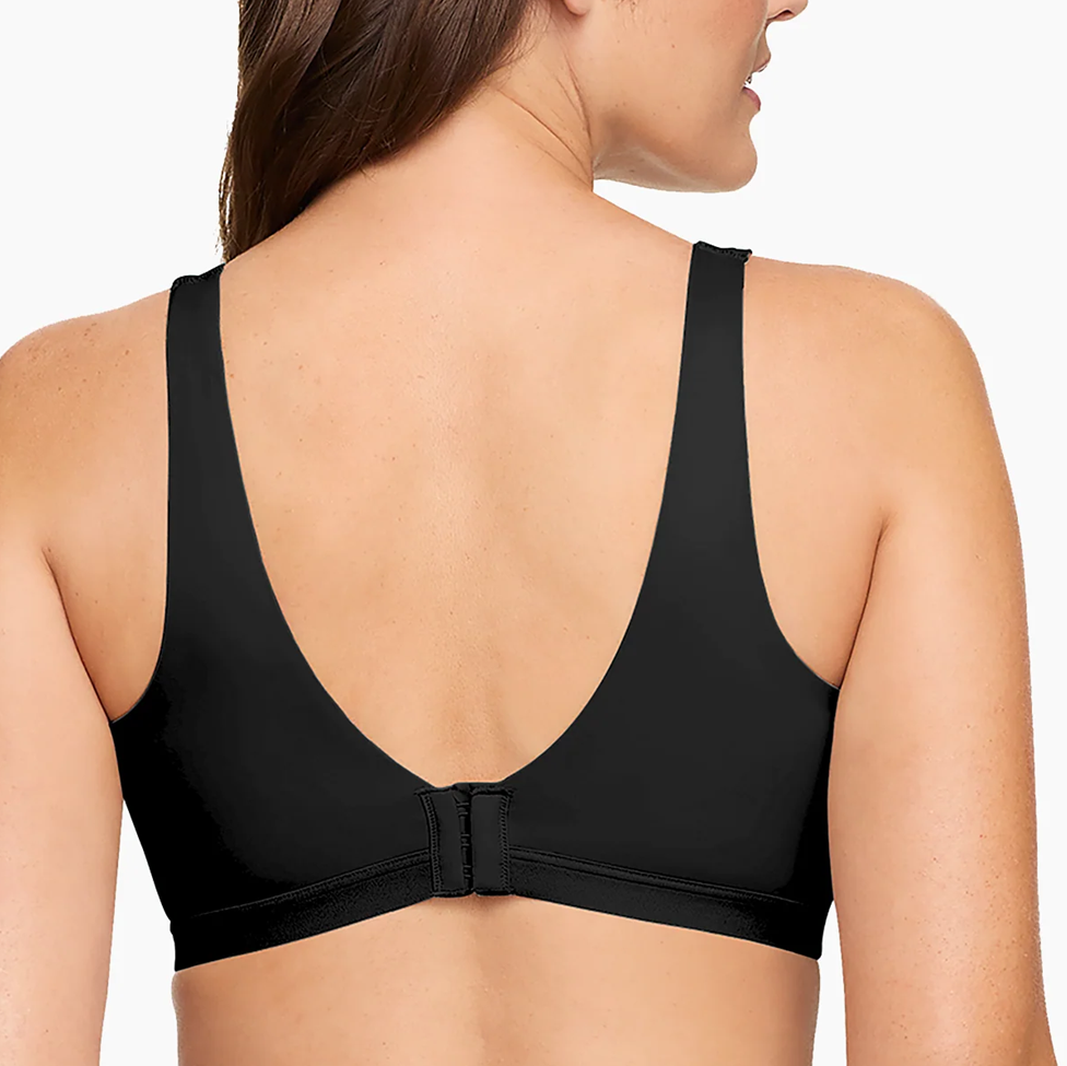Black bra worn by a person on a white background