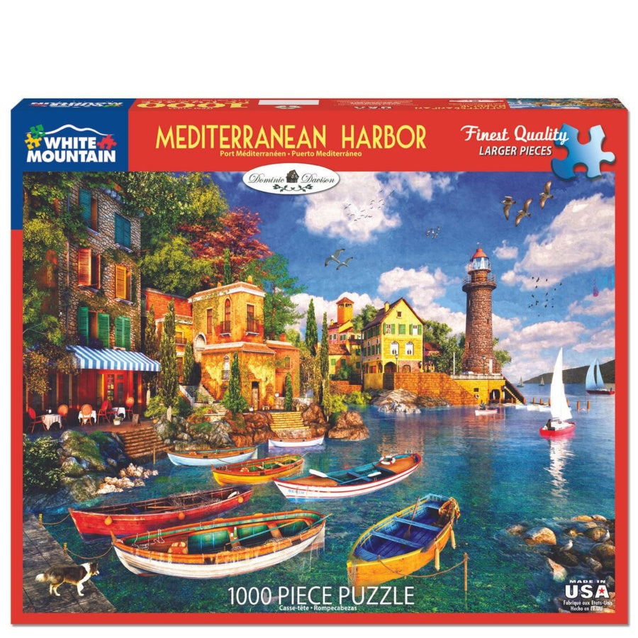 Jigsaw puzzle box featuring a scenic Mediterranean harbor with boats and buildings.