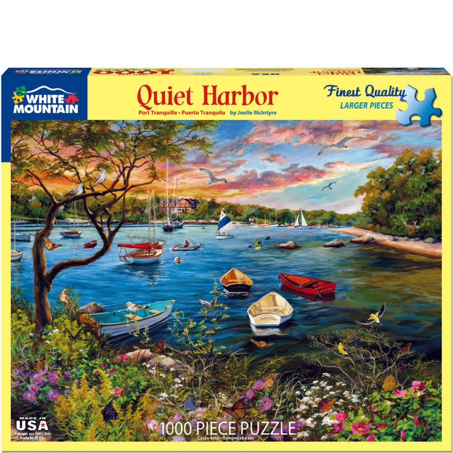 Jigsaw puzzle box for 'Quiet Harbor' by White Mountain Puzzles with a scenic lake and boats illustration.