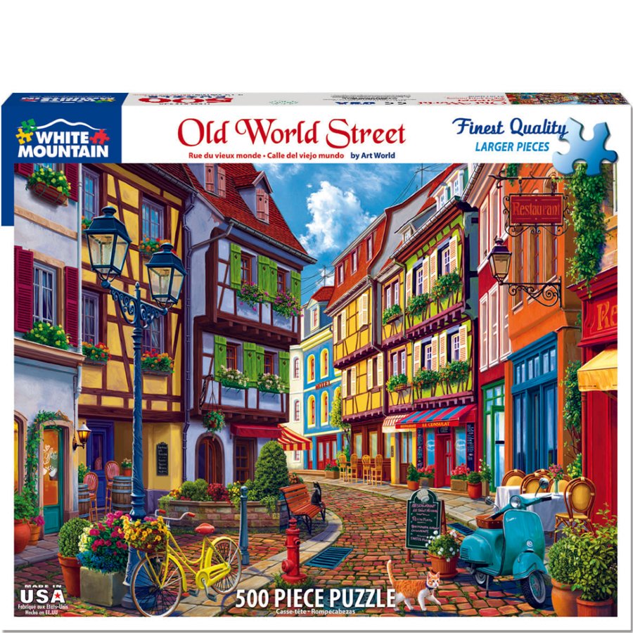 Jigsaw puzzle box featuring a colorful street scene with buildings and a bicycle.