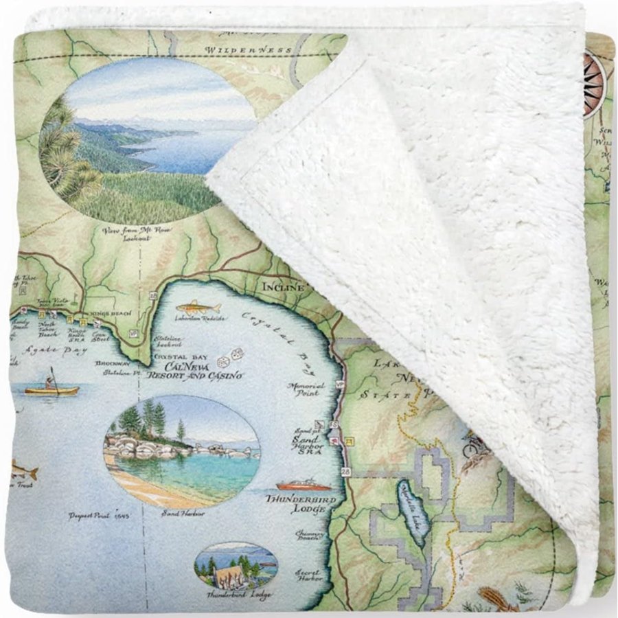 Map-themed blanket with scenic illustrations on a white background